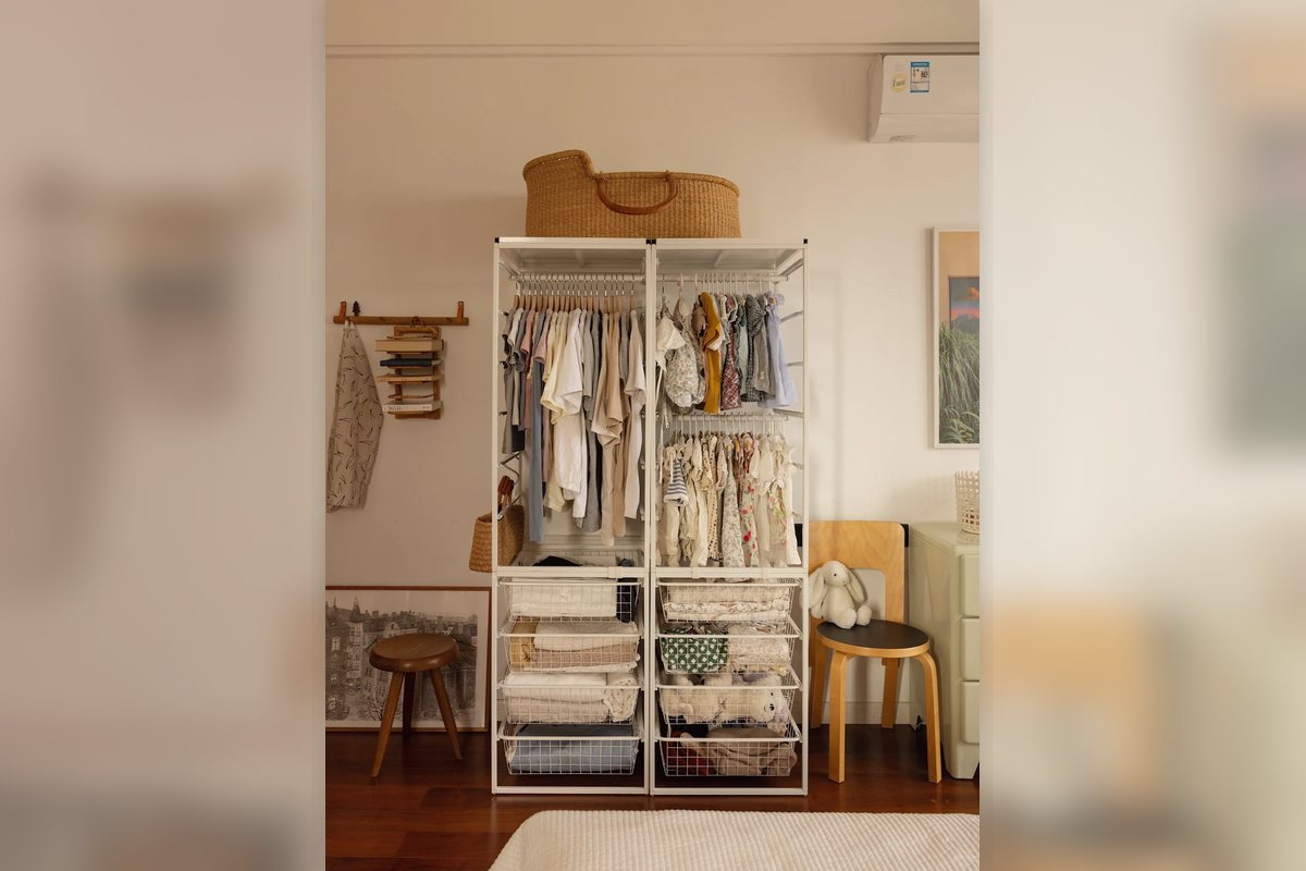 Open clothing rack with drawers and folded storage for seasonal clothes.