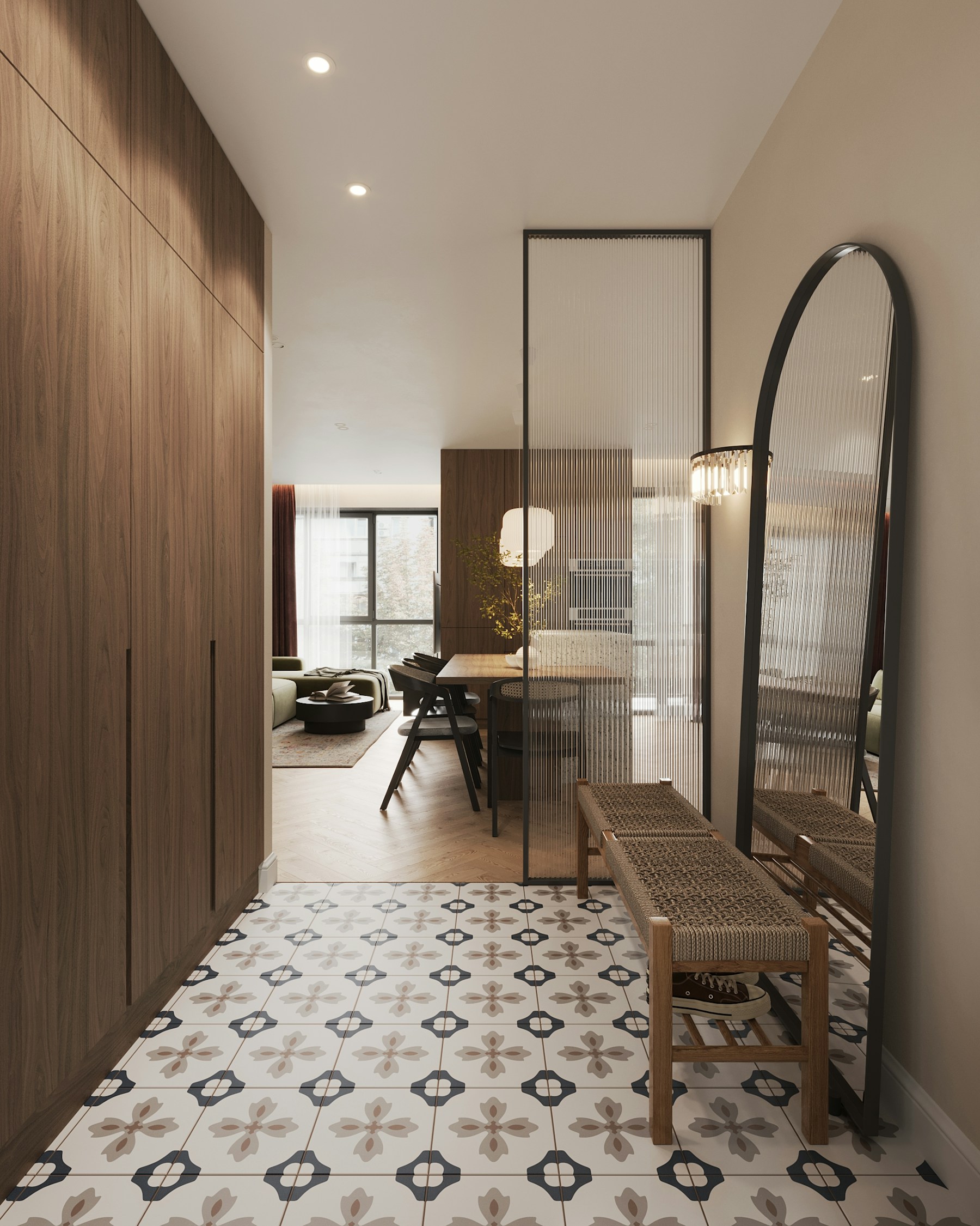 Real narrow apartment entry with a woven bench, mirror, shoe shelf, and full-height storage along one wall.