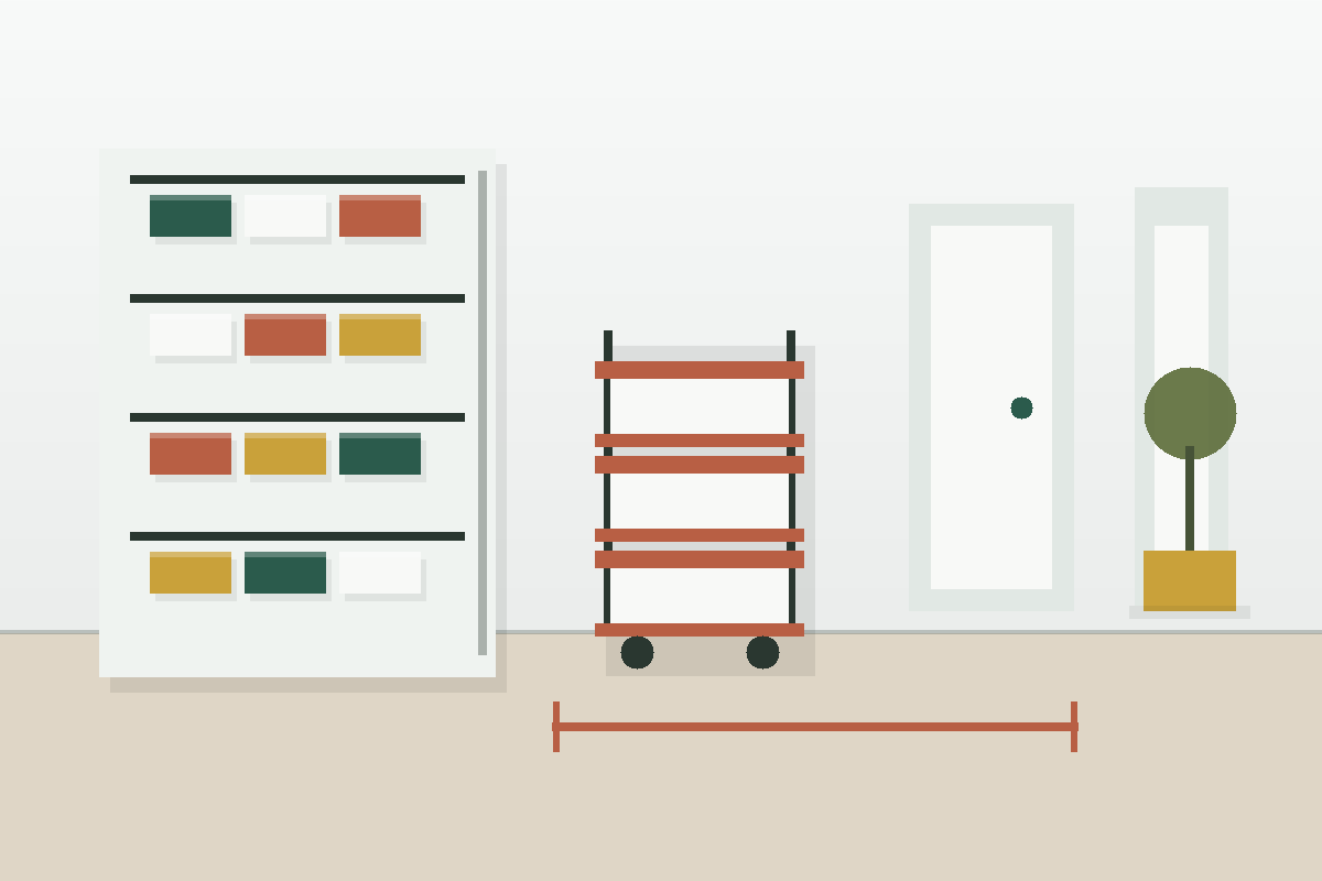Clean small kitchen layout with a slim rolling cart, cabinet doors, and walkway clearance.